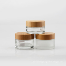 Eco Friendly Custom Logo Glass Cosmetic Jar 30g 50g Clear Frosted Glass Jars with Bamboo Wood Lid